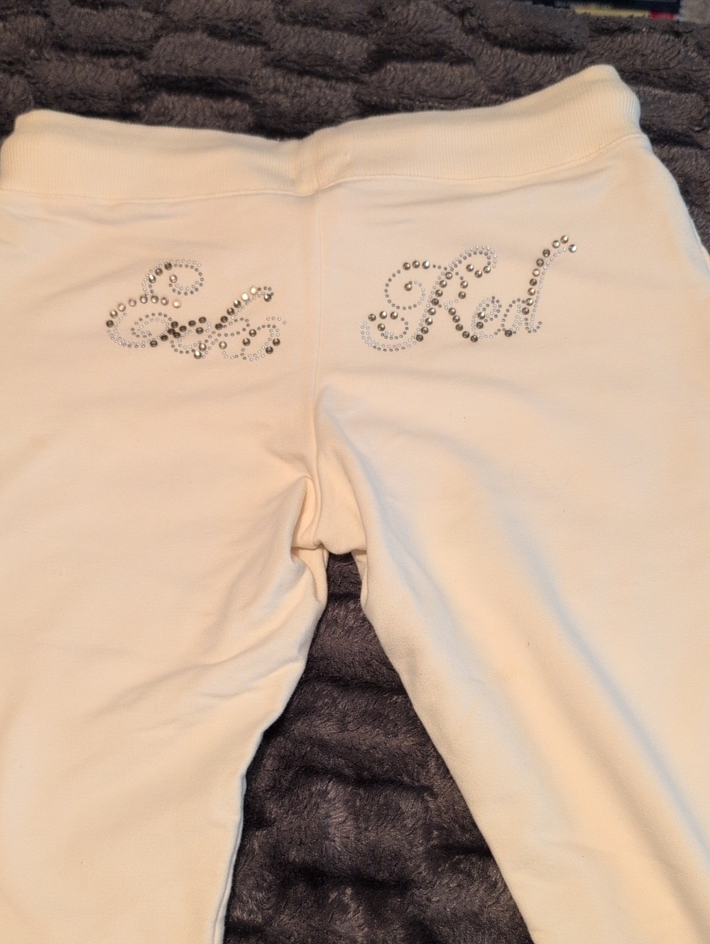 Marc Ecko Cream Sweatpants with Rhinestone Script